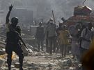 Policisté v Port-au-Prince se snaí zabránit rabování