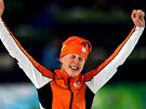 Ireen Wüstová z NIzozemska projevuje radost ze zisku zlaté medaile v závod na 1 500 metr na rychlobruslaském ovále na ZOH ve Vancouveru.