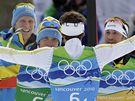 védové se radují ze zlaté olympijské medaile ze závodu tafet