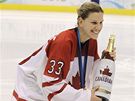Kanadské hokejistky oslavují olympijský triumf.