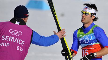 eský závodník Duan Koíek v cíli olympijského sprintu dvojic