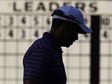 Tiger Woods ped dosud przdnou vsledkovou tabul pro Masters 2010.