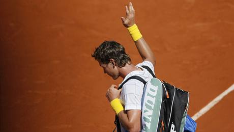 TAK ZASE ZA ROK. Tomá Berdych se po prohraném semifinále louí s Roland Garros