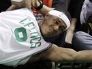 Rajon Rondo z Bostonu Celtics skonil ve snaze zachránit mí mezi fotografy
