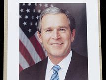 Drek na pamtku Fotografie od americkho prezidenta Bushe.