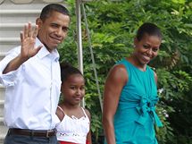 Barack Obama s manelkou a dcerou Sashou na dovolen v Panama City. (14. srpna 2010)