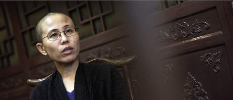 ínského disidenta Lioua Siao-poa navtívila ve vzení jeho ena. Úady pak na ni uvalily domácí vzení.