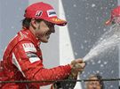 RADOST. Fernando Alonso z Ferrari se raduje ze tetího místa.