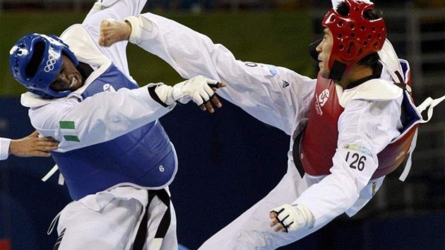 Taekwondo, Chika Yagazie Chukwumerije (vlevo), Akmal Irgashev 