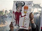 Král áblových král. Libyjec ukazuje karikaturu Kaddáfího v Benghází (2. bezna)