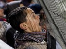 Palestinci sledují fotbalový zápas s Thajskem (9. bezna 2011)