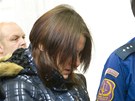 ena (uprosted) obalovaná z pokusu otrávit svou dceru fridexem na lavici obalovaných u plzeského krajského soudu