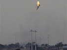 Sestelený letoun nad povstaleckou batou Banghází v Libyi. (19.3. 2011)