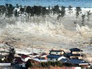 Niivá pívalová vlna se valí na japonské pobení msto Natori. (11. bezna 2011)