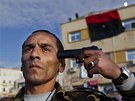 Jeden z povstalc naznauje, e pokud k nim dorazí Kaddáfí, bude snimi konec