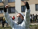 Anarchista proti DSSS v Krupce, pihlíelo poetné romské publikum (9. ledna 2011)