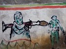 Ozbrojenci Hamásu oima lidového umlce na zdi v Gaze (13. dubna 2011)