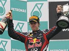 Sebastian Vettel slav triumf ve Velk cen Malajsie. 