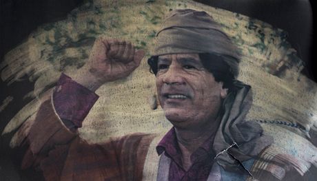 Portrét Muammara Kaddáfího v troskách rozbombardovaného domu v Tripolisu (21. kvtna 2011)