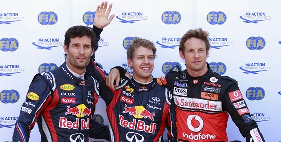 TI NEJRYCHLEJÍ. Mark Webber, Sebastian Vettel a Jenson Button (zleva) slaví své umístní v kvalifikaci na nedlní Velkou cenu Monaka.