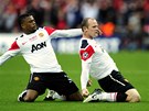VYROVNÁNO! Wayne Rooney z Manchesteru United slaví se spoluhráem Evrou vyrovnání ve finále Ligy mistr.