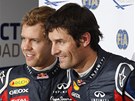 PARÁCI. Kolegové z Red Bullu Sebastian Vettel (vlevo) a Mark Webber pózují