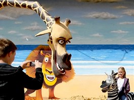 Písek, žirafa nebo zebra zobrazují Afriku a poušť.