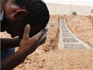 Libyjci v Benghází oplakávají své mrtvé (25, srpna 2011)
