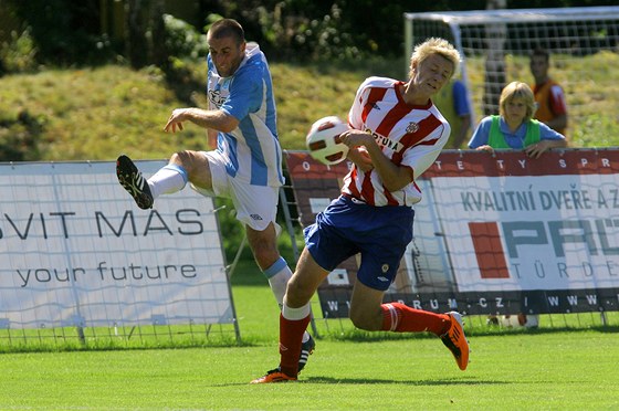 Dominik Simerský v ernobílém dresu Brna