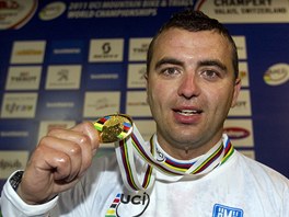 Michal Prokop na mistrovstv svta biker v Champry se zlatou medail z