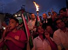 Palestinci poslouchají projev Mahmúda Abbáse v OSN (23. záí 2011)