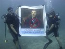 Syrtí demonstranti protestovali proti reimu prezidenta Baára Asada i pod