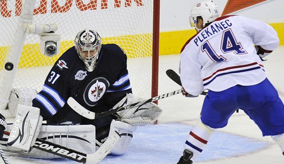 SOUPEI I PARÁCI. Tomá Plekanec válí v NHL za Montreal, Ondej pavelec chytá za WInnipeg. Z Kladna i z reprezentace se vak oba dobe znají.