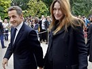 Francouzský prezident Sarkozy s thotnou manelkou