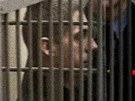 Uladzislav Kavaljov u minského soudu (30. listopadu 2011)
