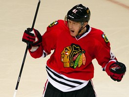 Marian Hossa z Chicaga slav svj gl proti Calgary.