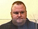 Kim Dotcom u aucklandskho soudu. Nebylo to poprv, kdy si na internetovho