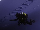 Italtí policejní potápi u vraku ztroskotané výletní lodi Costa Concordia