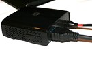 Malý pijíma bezdrátového obrazu a zvuku HP Wireless TV Connect.