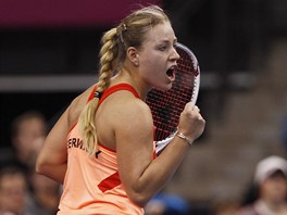 JO! Nmeck tenistka Angelique Kerberov se raduje bhem zpasu s Luci