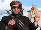 lenové vládních ozbrojených sil si v ulicích Tripolisu pipomínají první