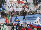 Prezidentský kandidát Vladimir Putin na tvrtením mítinku na moskevském