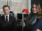 Carla Bruniová-Sarkozyová a Nicolas Sarkozy v zákulisí televize (6. bezna 2012)