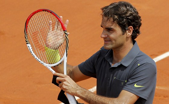 LEGENDA DKUJE. výcarský tenista Roger Federer práv vyhrál 234. utkání na