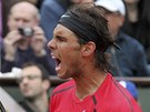 DLEITÝ BOD. Rafael Nadal se raduje z vítzného úderu ve finále Rolad Garros