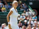 S ÚSMVEM. Petra Kvitová ve Wimbledonu.