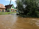 Následky bleskové noní povodn v Binách na umav.