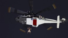 Parautista obleený jako královna Albta II. se snáí na Olympijský stadion...