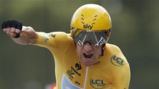 JÁ, ŠAMPION. Brit Bradley Wiggins slaví vítězství v předposlední etapě Tour de