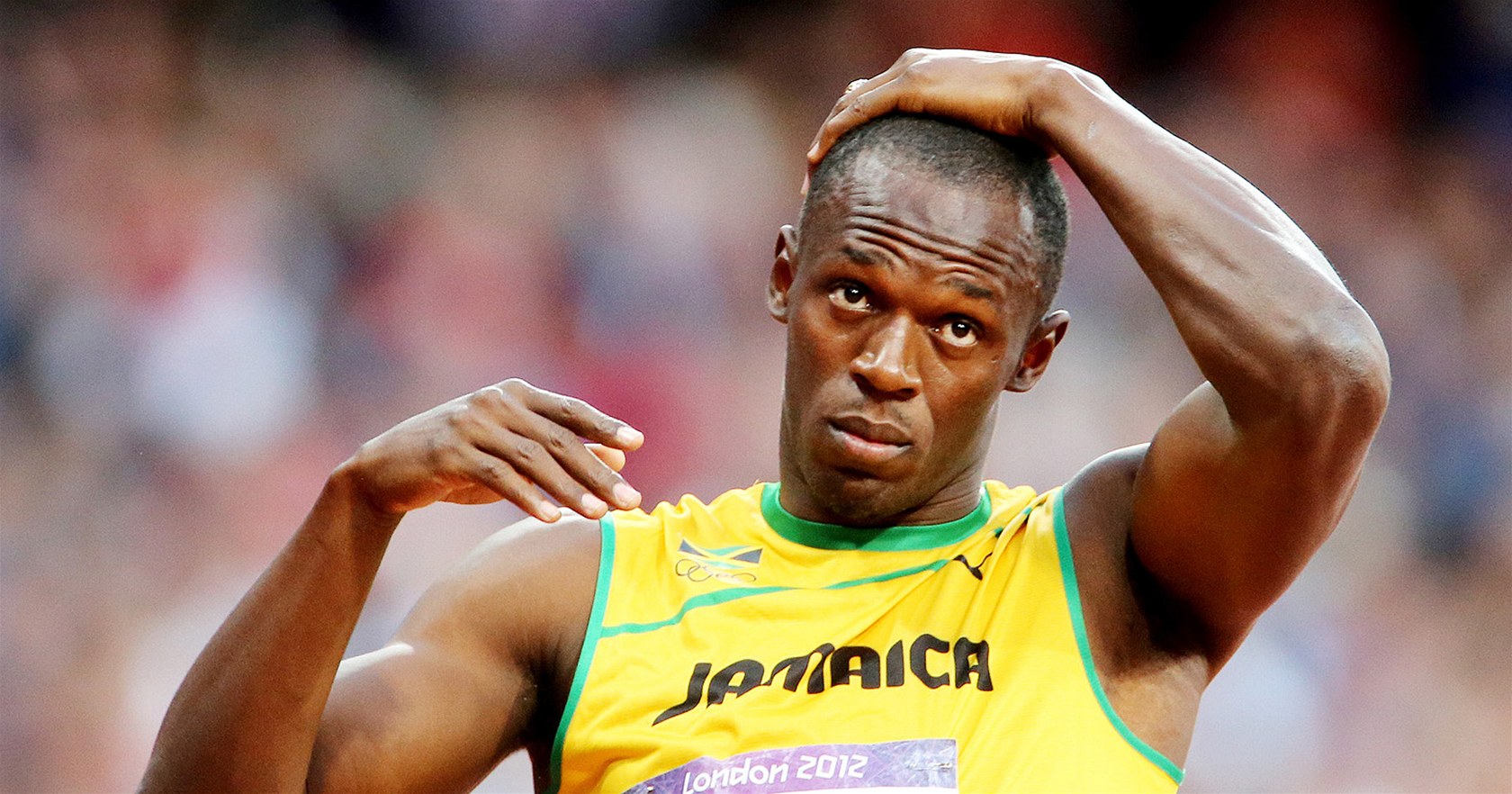 SOUSTEDNÍ. Jamajan Usain Bolt ped semifinálovým závoden na 200 metr. (8.